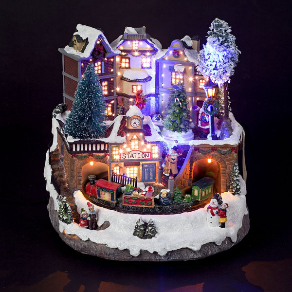 The Seasonal Aisle Light Up Christmas Village Scene with Moving Train